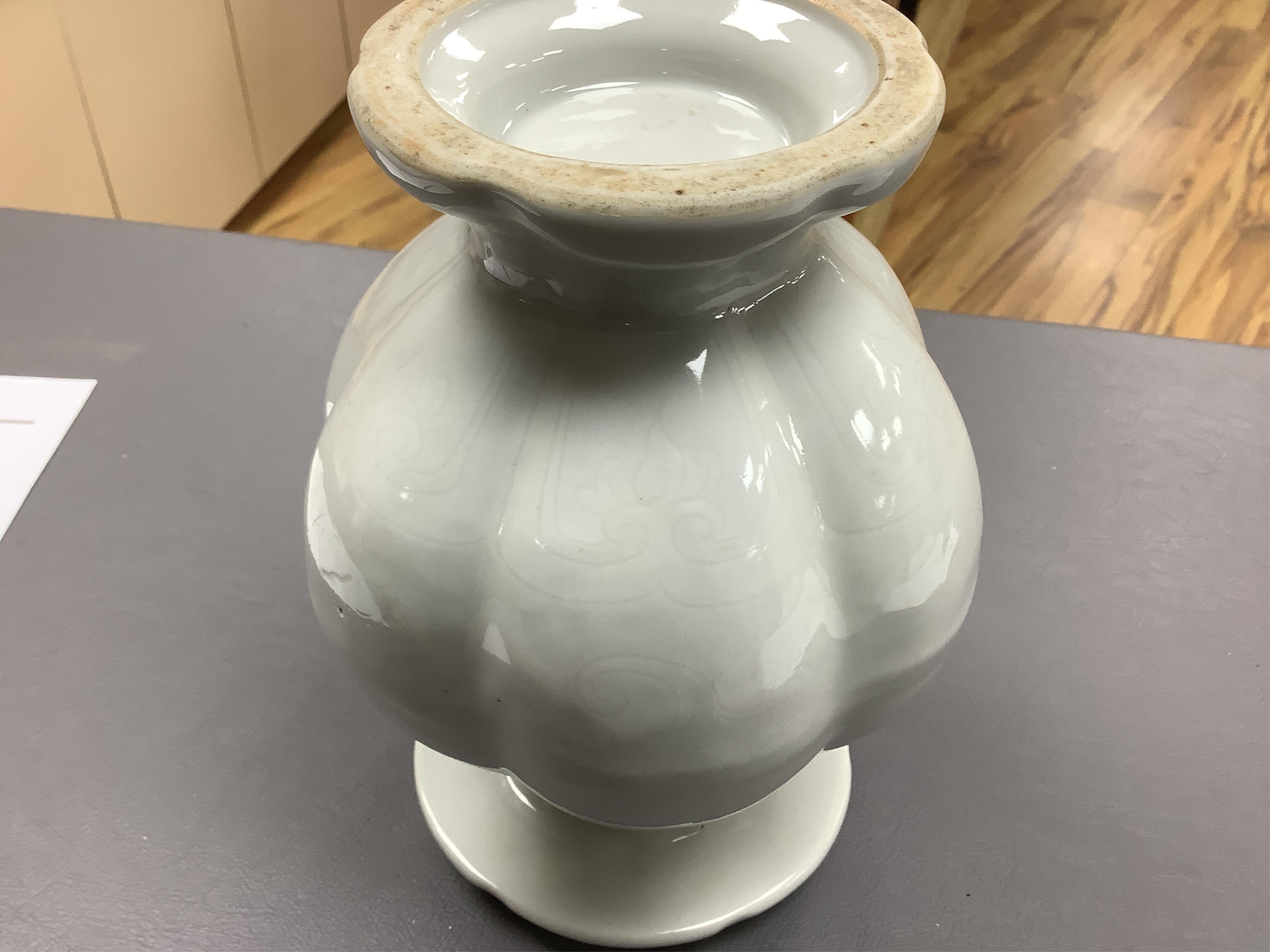 A Chinese anhua decorated vase, 20cm high